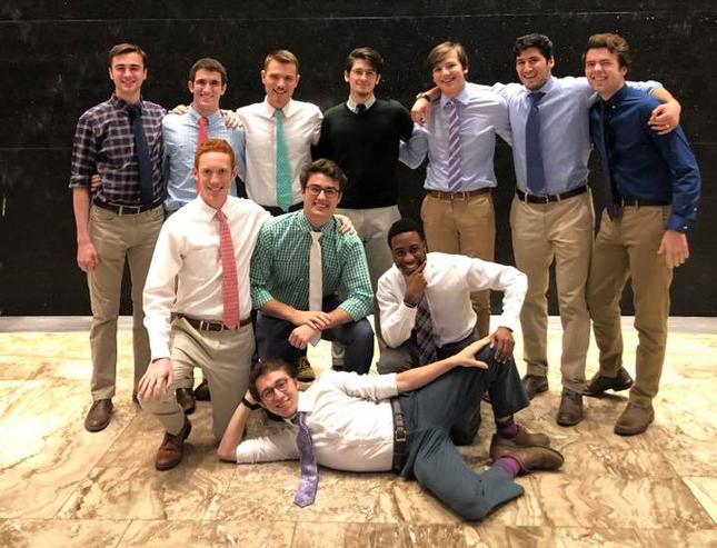 Group photo of a Skidmore men's acapella group